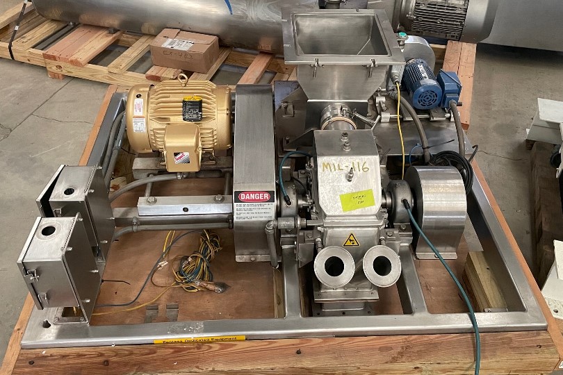 ***SOLD*** Fitzpatrick DKAS06 Fitzmill/Hammer Mill.  Screw Feed, Mounted in Stainless Steel Frame.  Driven by 10 HP, 230/460, volt, 3500 rpm motor. Last used in sanitary pharmaceutical plant. 